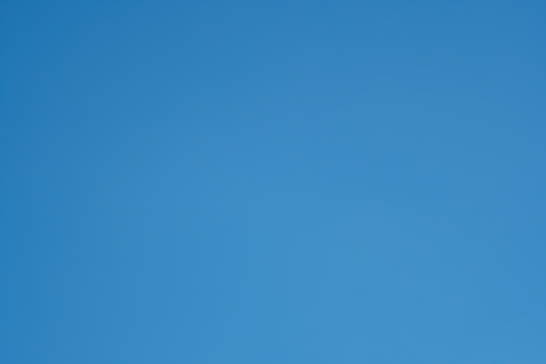 Plain blue sky background ,Space for text